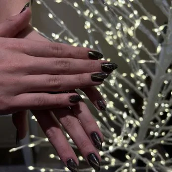 What are the contact details and location of Nail by Nail Chicago