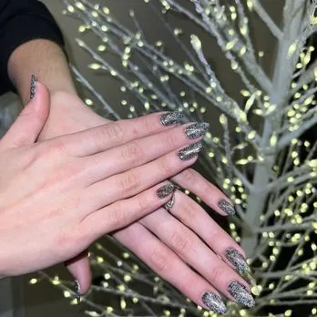 What types of nail services does Nail by Nail Chicago offer